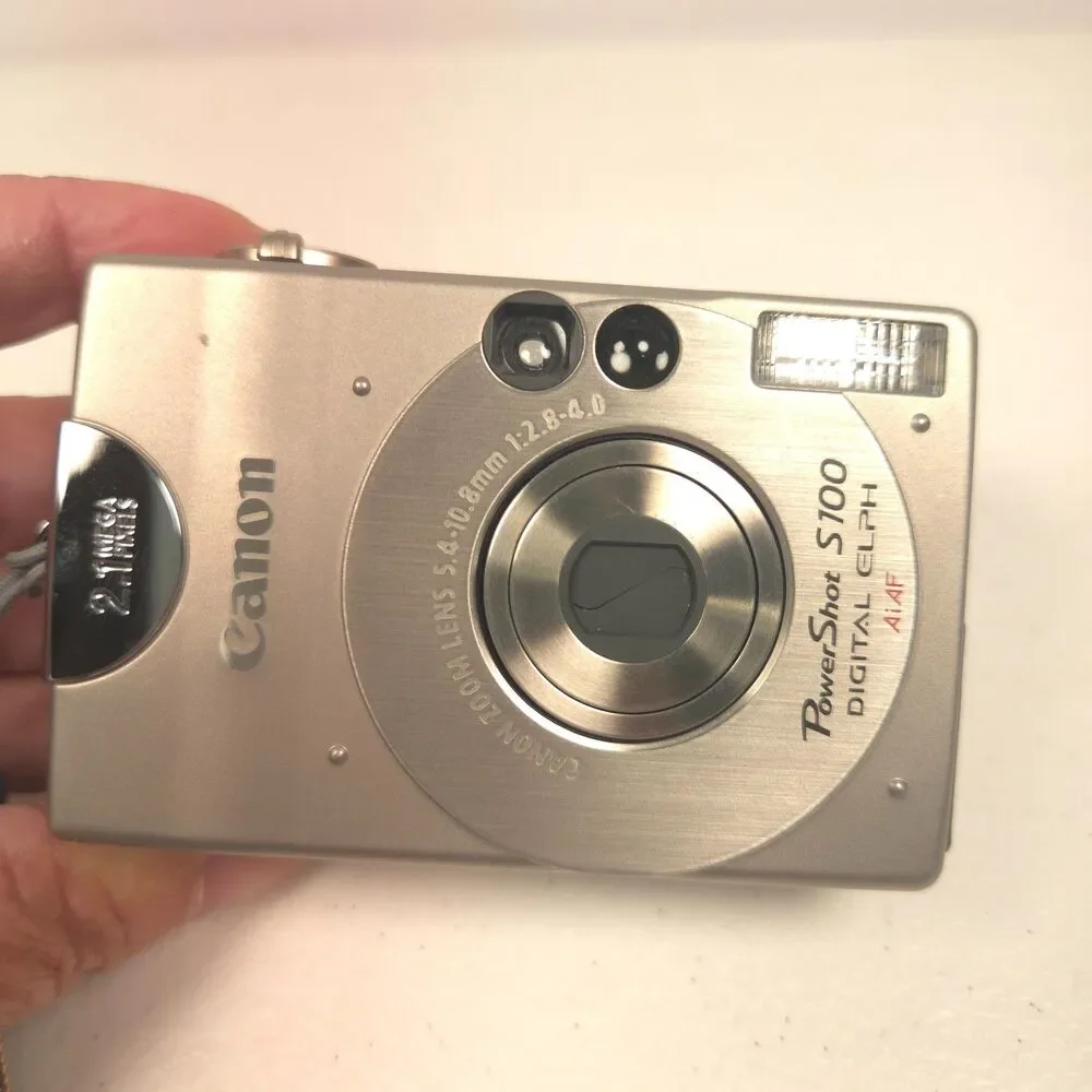 Canon PowerShot S100 Digital ELPH Camera Bundle Case Flash Battery Tested